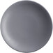 A round, granite-colored satin matte porcelain coupe plate.