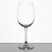 A clear 16 oz. wine glass with a rounded bowl and slender stem.