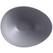 A matte gray porcelain bowl with an organic, asymmetrical shape.