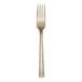 A gold-colored stainless steel dinner fork with a simple, modern design.