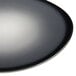 A round, dark gray porcelain plate with a smooth, matte finish.