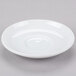 A white porcelain tea saucer with a slightly raised center.