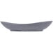 A gray, oval-shaped porcelain coupe plate with a matte finish.