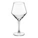 A clear, stemmed wine glass with a wide bowl and narrow rim.