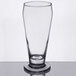 A clear 12 oz. footed pilsner glass.