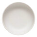 A white satin matte porcelain low bowl.