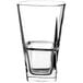 A clear, stackable 16 oz. cooler glass with a slightly tapered design.