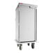 A stainless steel meal delivery cart with a single door, top rail, and four wheels.