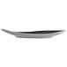 A black and white oblong porcelain tray with gently curved edges.