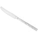A stainless steel dinner knife with a textured handle and a smooth blade.