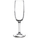A clear 6 oz. flute glass with a long stem and narrow bowl.