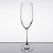 A clear 8 oz. champagne flute with a slender stem and gently curved bowl.