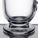 A clear glass coffee mug with a sturdy base and handle.