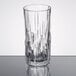 A clear Nachtmann Shu Fa 12.25 oz. longdrink or Collins glass with a textured, geometric design.