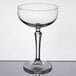 A clear Libbey Speakeasy 8.5 oz. coupe glass with a wide bowl and a sturdy stem.