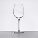 A clear stemmed wine glass with pour control markings for 9 oz. and 6 oz. measurements.