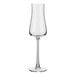 A clear, tall flute glass with a long stem and a narrow bowl.