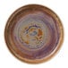 A round porcelain plate with a deep raised rim and a multicolored glaze featuring shades of brown, purple, and blue.