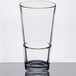 A clear, stackable mixing glass with a 17.25 oz. capacity.