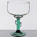 A 16 oz. margarita glass with a green cactus-shaped stem.