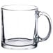 A clear glass mug with a handle, designed for warm beverages and holding 13 ounces.