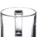 A clear glass 13 oz. warm beverage mug.