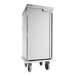 A stainless steel meal delivery cart with a single door and four wheels.