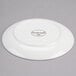 A white porcelain coupe plate with 'Syracuse 305 Royal Rideau' marked on the bottom.