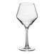 A clear, stemmed wine glass with a wide bowl and narrow rim.