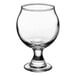 A clear 5 oz. Belgian beer tasting glass with a rounded bowl and short stem.