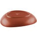 A clay satin matte organic porcelain coupe plate shown upside down.
