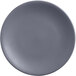 A round, granite-colored satin matte porcelain coupe plate.