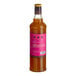 A 750 mL bottle of Liber & Co Tropical Passionfruit Syrup with a pink label.