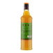 A 750 mL bottle of Liber & Co Pineapple Gum Syrup with a green label and yellow liquid inside.