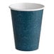 A 12 oz. single wall blue speck print poly paper hot cup.