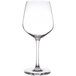 A close-up of a clear Chef & Sommelier wine glass with a stem.