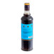 A 750 mL bottle of Liber & Co Demerara Gum Syrup with a blue label.