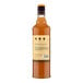 A 750 mL bottle of Liber & Co Texas Grapefruit Shrub with a yellow label and dark cap.