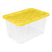 A clear plastic storage tote with a yellow lid.
