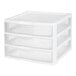 A white plastic countertop storage unit with three drawers.
