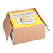 A box containing a pre-cut limoncello ricotta cheesecake.
