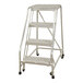 A four-step welded aluminum rolling ladder with serrated tread and a 350 lb. capacity.