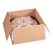 A pre-cut red velvet ricotta cheesecake in a cardboard shipping box.