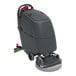 A commercial floor scrubber with a traction drive and a large water tank, designed for cleaning large floor areas.