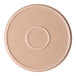 A tan round porcelain plate with a raised rim and a central circular indentation.