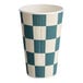 A 16 oz. navy checkered double wall ripple paper hot cup.