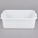 A white Tablecraft plastic freezer safe drain box with handles.