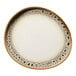 An irregular oval porcelain platter with a raised rim, featuring a brown and cream color scheme and a spotted rim design.