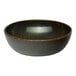 A black round embossed porcelain coupe bowl.
