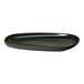 An oval asymmetric black porcelain coupe platter.